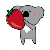 大きな苺を持っているコアラ