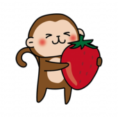 大きな苺を持っている猿