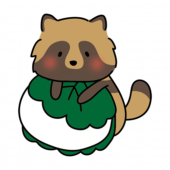 柏餅の上に乗っかるタヌキ