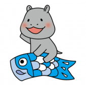 鯉のぼりにまたがっているカバ