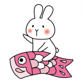鯉のぼりにまたがる白いうさぎ