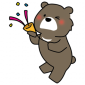 パーティーでクラッカーを鳴らすクマ