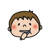 左の奥歯の側面を歯磨きする子供（男の子）