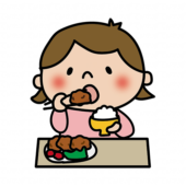 ご飯と一緒に唐揚げを食べている子供（女の子）