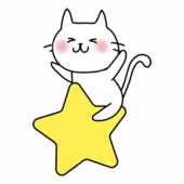 大きなお星さまに乗っている白い猫