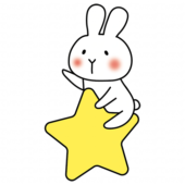 大きなお星さまに乗っている白いうさぎ