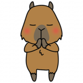 手を合わせて願い事をするカピバラ