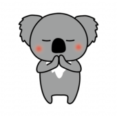 手を合わせて願い事をするコアラ