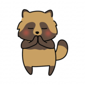 手を合わせて願い事をするタヌキ