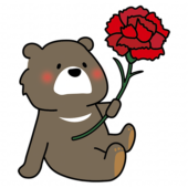 大きなカーネーションを持っているクマ