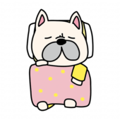 布団で寝ているフレンチブルドッグ