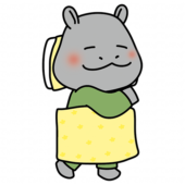 布団で寝ているカバ