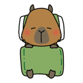 布団で寝ているカピバラ