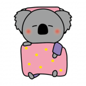 布団で寝ているコアラ