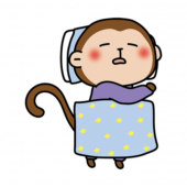 布団で寝ている猿