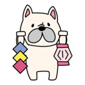 七夕飾りを持っているフレンチブルドッグ