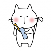 短冊に七夕の願い事を書く白い猫