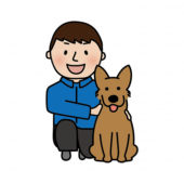 一緒に座っている男性ドッグトレーナーと立ち耳わんちゃん