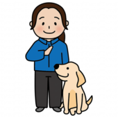 女性ドッグトレーナーと待てをするたれ耳わんちゃん