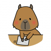 机を拭くお手伝いをするカピバラ