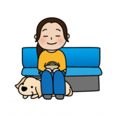 電車やバスで足の下に座るたれ耳の盲導犬