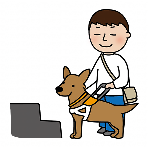 段差の前で立ち止まる立ち耳の盲導犬