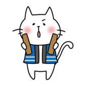 拍子木を持っている白い猫