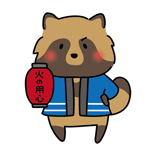 火の用心の提灯を持っているタヌキ