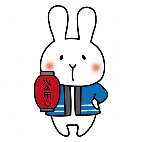 火の用心の提灯を持っている白いうさぎ