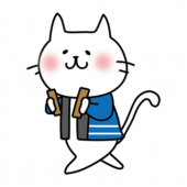 拍子木を持って火の用心の声掛けをしている白い猫