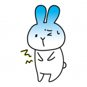 腹痛に苦しむ白いうさぎ