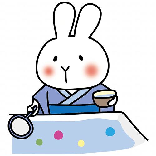 青い浴衣を着てボールすくいをする白いうさぎ