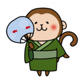 緑の浴衣を着てうちわを持っている猿