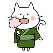 綿あめを持っている浴衣を着た白い猫