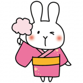 綿あめを持っている浴衣を着た白いうさぎ