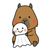 大きなてるてる坊主を持っているカピバラ