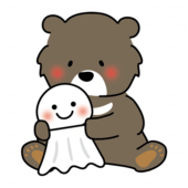 大きなてるてる坊主を持っているクマ