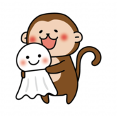 大きなてるてる坊主を持っている猿