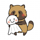 大きなてるてる坊主を持っているタヌキ