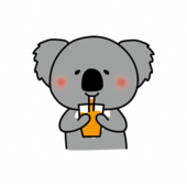 オレンジジュースを飲むコアラ