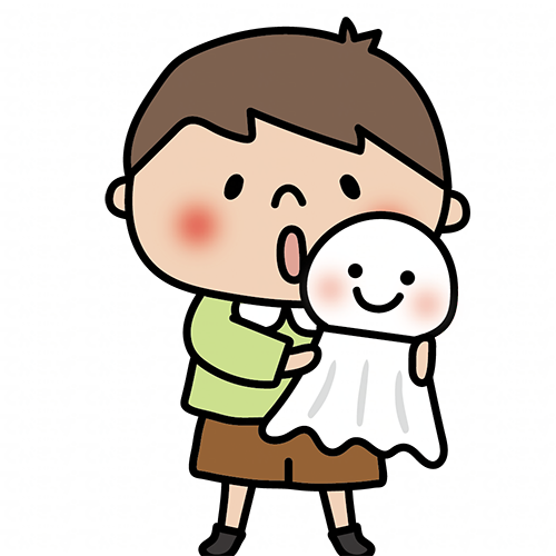 大きなてるてる坊主を持っている子供（男の子2）