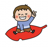 大きな落ち葉に乗る子供（男の子1）