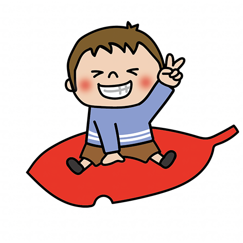 大きな落ち葉に乗る子供（男の子1）
