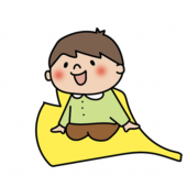 大きな落ち葉に乗る子供（男の子2）