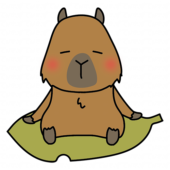 大きな落ち葉に乗るカピバラ