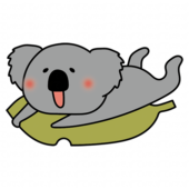 大きな落ち葉に乗るコアラ