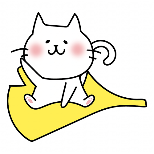 大きな落ち葉に乗る白い猫