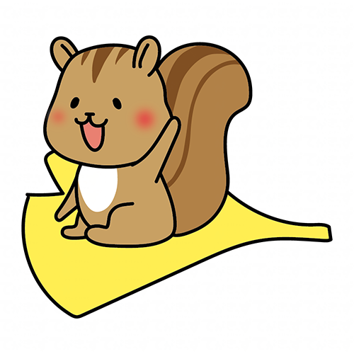 大きな落ち葉に乗るリス