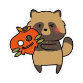 落ち葉のお面を持つタヌキ